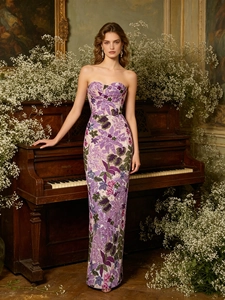 Elegant strapless evening gown with floral embroidery and sequins in a formal setting