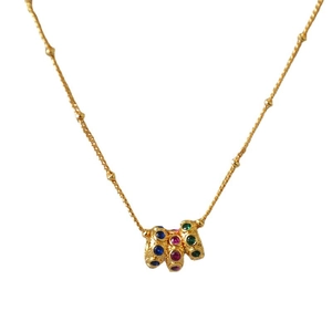 Collier rétro français en laiton doré avec pendentif en pierres de zircon colorées