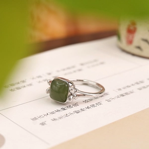 Detailed view of s925 silver ring featuring square nephrite jade and butterfly relief