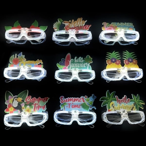 Close-up of 9 assorted LED glowing summer party glasses with flamingos and palm trees