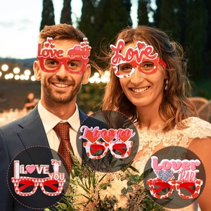 Valentine's Day heart-shaped party glasses with 'Love' slogans for photo booth props