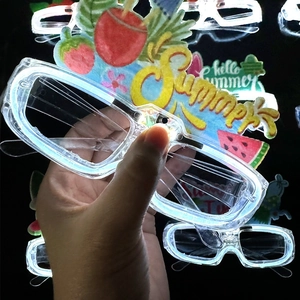 Close-up of LED glowing shutter glasses with colorful summer-themed fruit patterns