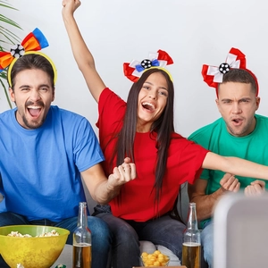 Three World Cup themed football bow headbands for fans in blue, red, and yellow colors