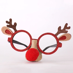 Christmas reindeer glasses with red glitter frames, brown antlers, and a plush pompom nose