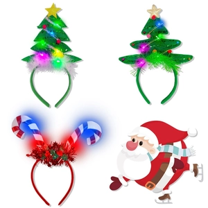 Detail view of LED Christmas tree and candy cane headbands with glowing light effects
