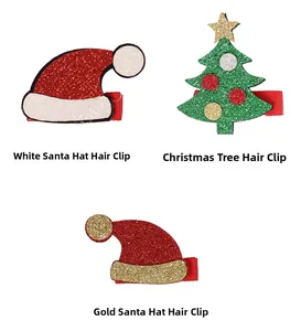 Detailed view of sequined Christmas clips with Santa hat and tree designs on white base