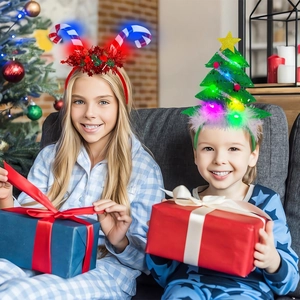 Kids wearing LED Christmas headbands with candy canes and glowing stars in festive room