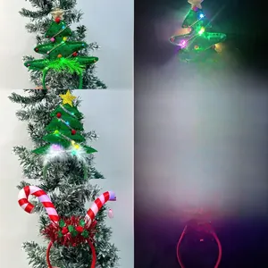 Detail of LED Christmas headbands showing light-up Xmas tree and candy cane designs