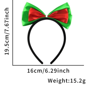 Detail view of the red and green satin bow headband with size and weight annotations