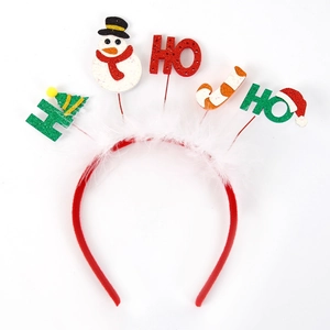 Détail du serre-tête de Noël HO HO HO avec paillettes, bonhomme de neige et plumes