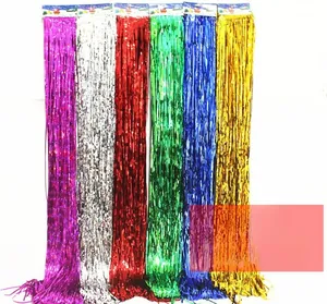 Detail showing six colors of metallic tinsel curtains for festive party decorations
