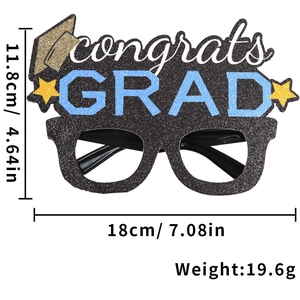 Black glitter graduation glasses with blue 'GRAD' text and mortarboard design details