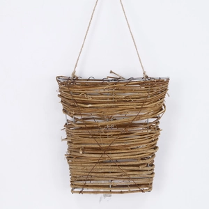 Detail of hand-woven wicker wall basket with natural wood tones and hemp rope hanger
