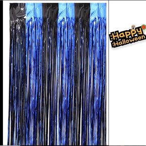 Close-up of blue and black metallic tinsel curtain for Halloween party background decoration