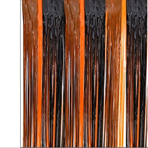 Detail of Halloween fringe curtain with orange and black vertical stripes for party decor