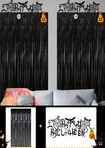 Macro detail of Halloween party set with black foil fringe curtain and spooky banner décor