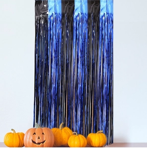 Blue and black metallic fringe curtain for Halloween party backdrop decoration with pumpkins