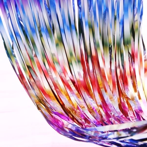 Rainbow tinsel curtain background with colorful gradient fringe for party decoration