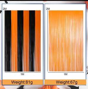 Detail of 1x2m Halloween orange and black fringe curtains with weight specifications