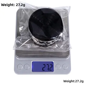 Weight display of 10m Halloween black skull ribbon roll on a digital scale