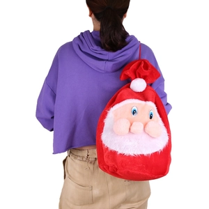 Plush Santa Claus drawstring backpack shown on a model for holiday gift storage