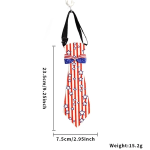 Detailed view of patriotic pet tie with red white and blue stars and stripes patterns