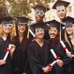 Variety pack of graduation party glasses with glitter slogans for photo booth props