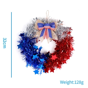 Close-up of 32cm Independence Day tinsel wreath with stars and patriotic bow detail