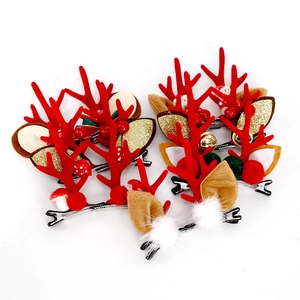 Barrettes de Noël bois de renne avec baies rouges et clochettes pour coiffure de fête enfant