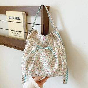 Women Floral Canvas Backpack Pastoral Style Drawstring Bag With Bow Detail For Daily Travel Lightweight Fashion Shoulder Bag