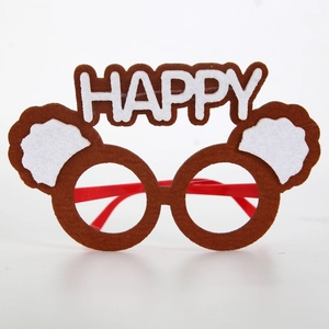 Close-up of brown felt Happy Birthday party glasses with white letters and red temples