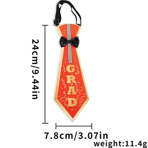 Detail of orange glitter GRAD tie with dimensions 24cm by 7.8cm for graduation party