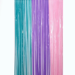 Colorful macaron foil fringe curtain backdrop in teal, purple, and pink for party decor