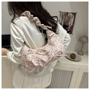 Floral canvas hobo bag with pink flower print and pleated cloud ruffle shoulder strap