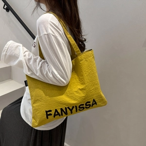 Large yellow canvas tote bag with black FANYISSA lettering for summer casual fashion