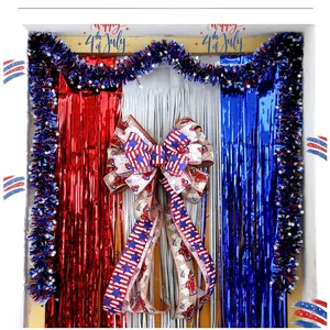 Independence Day decoration set featuring star streamers and a rustic USA flag truck bow