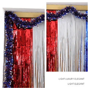 Detail of red white and blue metallic foil fringe curtains with star banner decoration