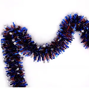 Detail of red and blue tinsel garland featuring shiny silver star-shaped sequins decor