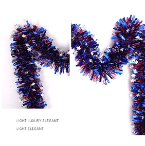 Detail of 2m Fourth of July tinsel garland with red blue silver stars for party decor