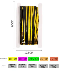Folded black and gold tinsel curtain packaging showing dimensions 22cm by 12.5cm