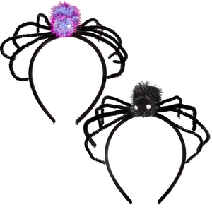 Close-up of two Halloween spider headbands with plush bodies and flexible legs on white base