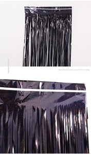 Detail of laser black tinsel curtain with rainbow shimmer for party wall decoration
