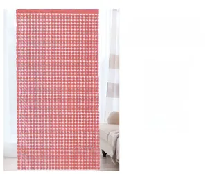 Macro detail of rose gold square sequin fringe curtain for festive party backdrop decor