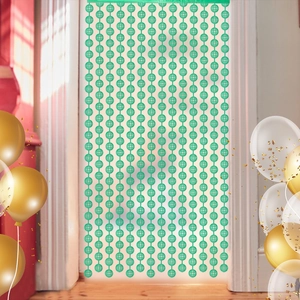 Detail of green disco ball fringe curtain for party wall decoration and festive background
