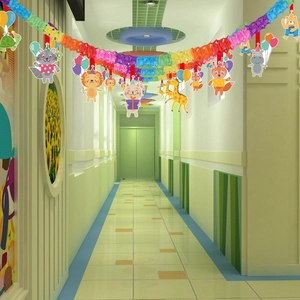 Detail of animal theme party banner with colorful paper fans and cute cartoon animal cutouts