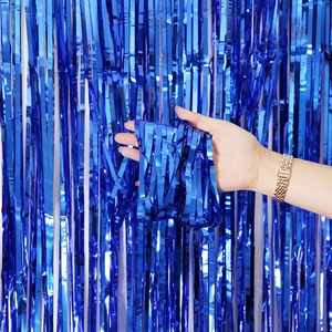 Vibrant electric blue metallic foil fringe curtain for birthday party backdrop decoration