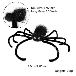 Macro detail of a plush black spider hair clip for pets showing the clip and dimensions