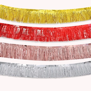 Metallic tinsel fringe curtains in gold, red, rose gold and silver for party backdrop