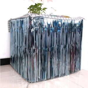 Close-up of bright blue metallic foil fringe curtain table skirt for party decorations