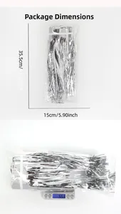 Silver fringe curtain in 35.5x15cm packaging weighing 55.3g for party decor